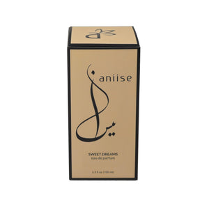 Glass bottle with a gold label featuring a logo on a gray background